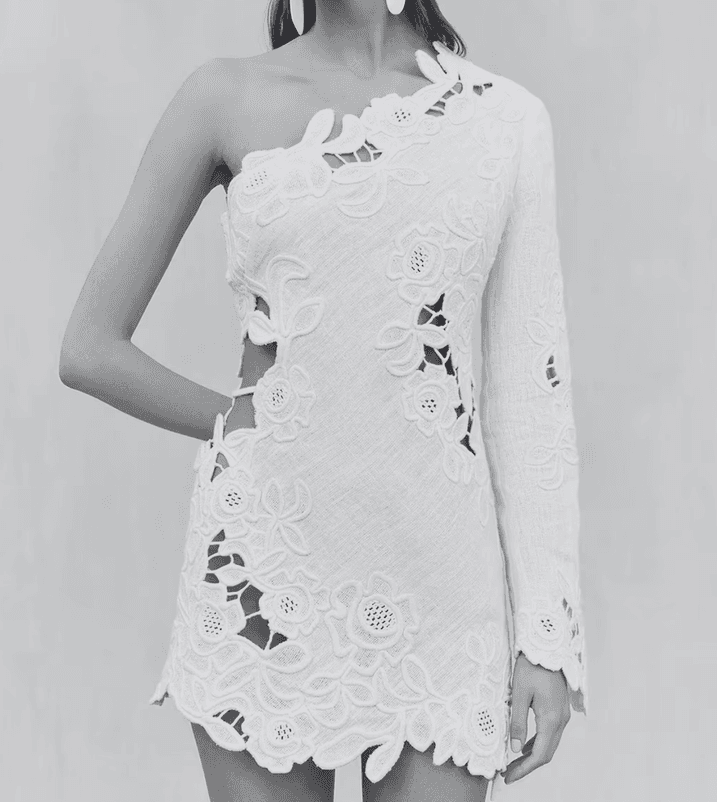 One-shoulder nude silk wrap dress with asymmetric draping