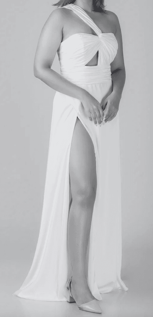 White tulle ball gown with voluminous layered skirt and train