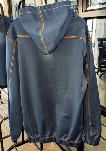 Modern grey wool blend coat with minimalist design and hidden buttons